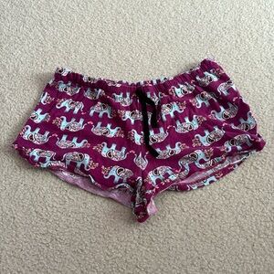 Secret Treasures cheeky purple pajama shorts.